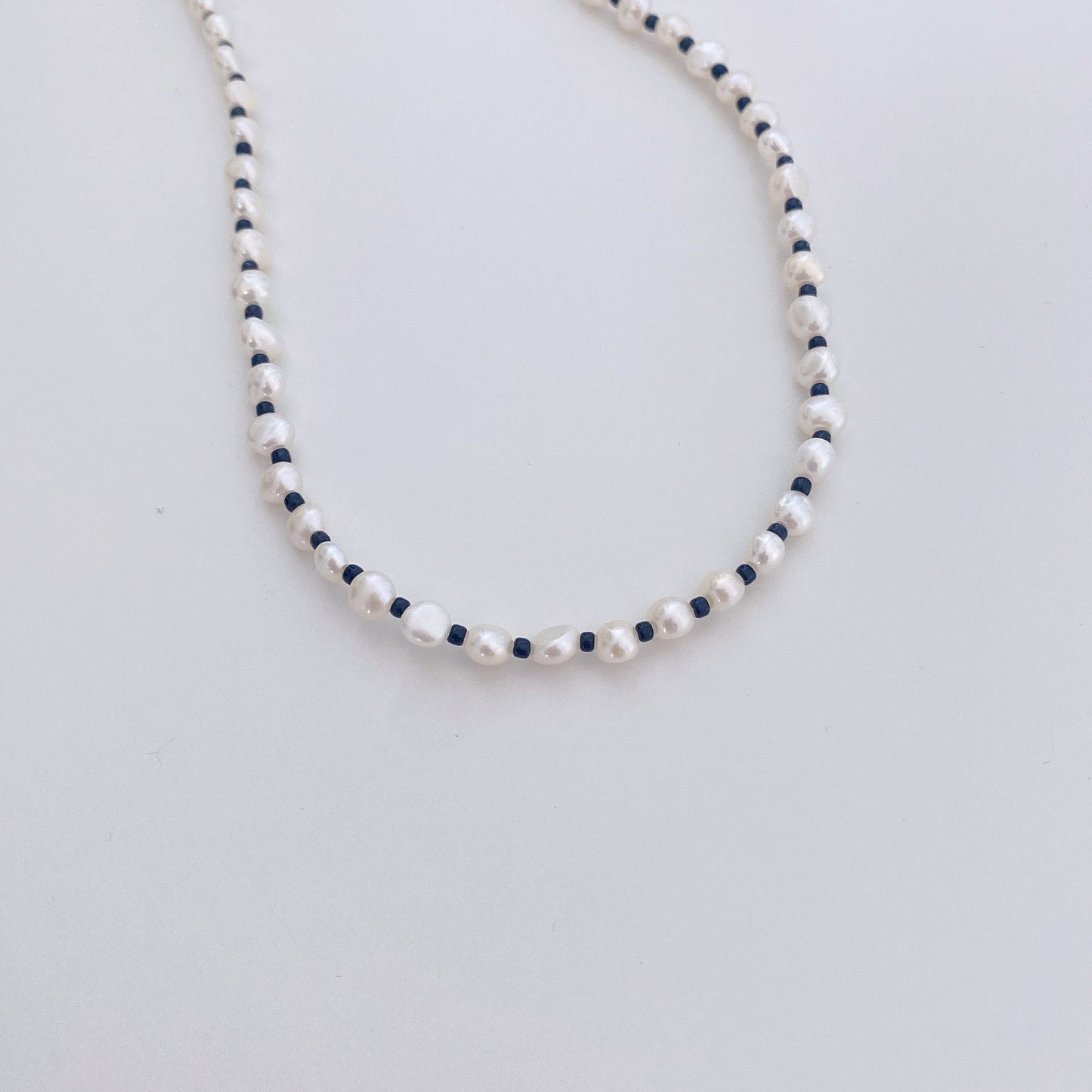 Maci Playful Black Beads and Irregular Freshwarer Pearl Necklace